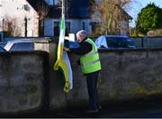 6 January 2024; Steward Pat Keegan prepares to fly the Offaly flag before the Dioralyte O'Byrne Cup quarter-final match between Offaly and Dublin at Gracefield GAA club in Kilmalogue, Offaly. Photo by Piaras Ó Mídheach/Sportsfile