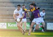 6 January 2024; Jack Sargent of Kildare in action against Dean O'Toole of Wexford during the Dioralyte O'Byrne Cup quarter-final match between Wexford and Kildare at Chadwicks Wexford Park in Wexford. Photo by Sam Barnes/Sportsfile