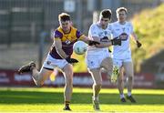 6 January 2024; Killian Galligan of Kildare in action against Tom Byrne of Wexford during the Dioralyte O'Byrne Cup quarter-final match between Wexford and Kildare at Chadwicks Wexford Park in Wexford. Photo by Sam Barnes/Sportsfile