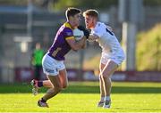 6 January 2024; Gavin Sheehan of Wexford in action against Shane Farrell of Kildare during the Dioralyte O'Byrne Cup quarter-final match between Wexford and Kildare at Chadwicks Wexford Park in Wexford. Photo by Sam Barnes/Sportsfile