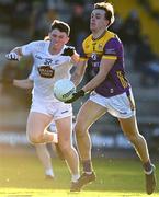 6 January 2024; Liam Coleman of Wexford in action against Alex Beirne of Kildare during the Dioralyte O'Byrne Cup quarter-final match between Wexford and Kildare at Chadwicks Wexford Park in Wexford. Photo by Sam Barnes/Sportsfile