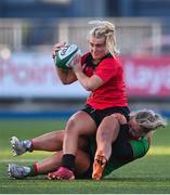 6 January 2024; Seren Singleton of Brython Thunder is tackled by Sadhbh McGrath of Clovers during the Celtic Challenge match between Clovers and Brython Thunder at Energia Park in Dublin. Photo by Seb Daly/Sportsfile