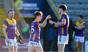 6 January 2024; Wexford players Ben Brosnan, left, and Liam Coleman celebrate after their side's victory in the Dioralyte O'Byrne Cup quarter-final match between Wexford and Kildare at Chadwicks Wexford Park in Wexford. Photo by Sam Barnes/Sportsfile