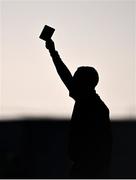 6 January 2024; Referee Enda Kelly shows the black card to Peter Duffy of Dublin, not pictured, during the Dioralyte O'Byrne Cup quarter-final match between Offaly and Dublin at Gracefield GAA club in Kilmalogue, Offaly. Photo by Piaras Ó Mídheach/Sportsfile