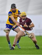 6 January 2024; Micheál Lyons of Galway in action against Conor Mulry of Roscommon during the Connacht Hurling League Shield final match between Roscommon and Galway at University of Galway Connacht GAA AirDome in Bekan, Mayo. Photo by Tyler Miller/Sportsfile