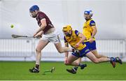 6 January 2024; Seanie Joyce of Galway evades the tackle of Declan Leonard of Roscommon during the Connacht Hurling League Shield final match between Roscommon and Galway at University of Galway Connacht GAA AirDome in Bekan, Mayo. Photo by Tyler Miller/Sportsfile