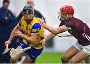 6 January 2024; Conor Mulry of Roscommon in action against Fergus Hanney of Galway during the Connacht Hurling League Shield final match between Roscommon and Galway at University of Galway Connacht GAA AirDome in Bekan, Mayo. Photo by Tyler Miller/Sportsfile