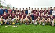 6 January 2024; The Galway players and staff pose for a photograph with the trophy after their side's victory in the Connacht Hurling League Shield final match between Roscommon and Galway at University of Galway Connacht GAA AirDome in Bekan, Mayo. Photo by Tyler Miller/Sportsfile