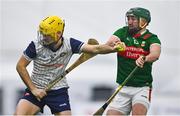 6 January 2024; Darragh Hynes of New York in action against Michael Farrell of Mayo during the Connacht Hurling League Cup final match between New York and Mayo at University of Galway Connacht GAA AirDome in Bekan, Mayo. Photo by Tyler Miller/Sportsfile