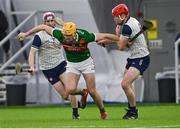 6 January 2024; Cormac Phillips of Mayo in action against Conor Caulfield of New York, left, and Darragh Moran during the Connacht Hurling League Cup final match between New York and Mayo at University of Galway Connacht GAA AirDome in Bekan, Mayo. Photo by Tyler Miller/Sportsfile