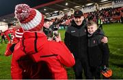 6 January 2024; Derry manager Mickey Harte, with 12 year old Derry supporter Jack McLarnon, from Ballynascreen, after the Bank of Ireland Dr McKenna Cup Group B match between Derry and Down at Celtic Park in Derry. Photo by Ramsey Cardy/Sportsfile