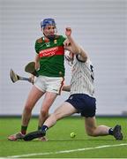 6 January 2024; Sean Mulroy of Mayo is tackled by Conor Caulfield of New York during the Connacht Hurling League Cup final match between New York and Mayo at University of Galway Connacht GAA AirDome in Bekan, Mayo. Photo by Tyler Miller/Sportsfile