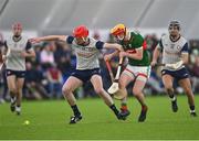 6 January 2024; Ger McPartland of New York in action against Conor Murray of Mayo during the Connacht Hurling League Cup final match between New York and Mayo at University of Galway Connacht GAA AirDome in Bekan, Mayo. Photo by Tyler Miller/Sportsfile