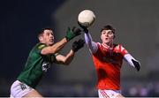 6 January 2024; Peter McStravick of Louth in action against Donal Keogan of Meath during the Dioralyte O'Byrne Cup quarter-final match between Meath and Louth at Donaghmore Ashbourne GAA Club in Ashbourne, Meath. Photo by Seb Daly/Sportsfile