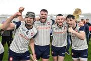 6 January 2024; New York players, from left, Martin Cullen, David Mangan, Ruadhan Mulrooney, and Eanna Barry celebrate after their side's victory in the Connacht Hurling League Cup final match between New York and Mayo at University of Galway Connacht GAA AirDome in Bekan, Mayo. Photo by Tyler Miller/Sportsfile
