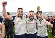 6 January 2024; New York players, from left, David Mangan, Ruadhan Mulrooney, and Eanna Barry celebrate after their side's victory in the Connacht Hurling League Cup final match between New York and Mayo at University of Galway Connacht GAA AirDome in Bekan, Mayo. Photo by Tyler Miller/Sportsfile
