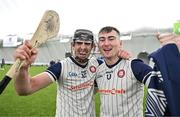 6 January 2024; Martin Cullen of New York, left, and team-mate AJ Willis celebrate after their side's victory in the Connacht Hurling League Cup final match between New York and Mayo at University of Galway Connacht GAA AirDome in Bekan, Mayo. Photo by Tyler Miller/Sportsfile