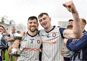 6 January 2024; Darragh Hynes of New York, left, and team-mate AJ Willis celebrate with the cup after the Connacht Hurling League Cup final match between New York and Mayo at University of Galway Connacht GAA AirDome in Bekan, Mayo. Photo by Tyler Miller/Sportsfile