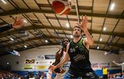 6 January 2024; Eoin Quigley of Tralee Warriors in action against Andre Nation of Ballincollig during the Basketball Ireland Pat Duffy National Cup semi-final match between Garvey’s Tralee Warriors and Irish Guide Dogs Ballincollig at Neptune Stadium in Cork. Photo by Eóin Noonan/Sportsfile
