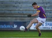 6 January 2024; Páraic Hughes of Wexford scores his side's third goal during the Dioralyte O'Byrne Cup quarter-final match between Wexford and Kildare at Chadwicks Wexford Park in Wexford. Photo by Sam Barnes/Sportsfile