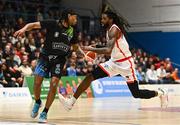 6 January 2024; Andre Nation of Ballincollig in action against Caleb Jordan of Tralee Warriors during the Basketball Ireland Pat Duffy National Cup semi-final match between Garvey’s Tralee Warriors and Irish Guide Dogs Ballincollig at Neptune Stadium in Cork. Photo by Eóin Noonan/Sportsfile