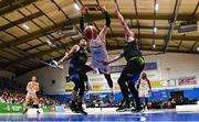 6 January 2024; Nikola Roso of Ballincollig in action against Rapolas Buivydas, left, and Kieran Donaghy of Tralee Warriors during the Basketball Ireland Pat Duffy National Cup semi-final match between Garvey’s Tralee Warriors and Irish Guide Dogs Ballincollig at Neptune Stadium in Cork. Photo by Eóin Noonan/Sportsfile