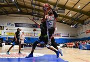 6 January 2024; Shawndale Jones Jnr of Ballincollig in action against Ryan Leonard of Tralee Warriors during the Basketball Ireland Pat Duffy National Cup semi-final match between Garvey’s Tralee Warriors and Irish Guide Dogs Ballincollig at Neptune Stadium in Cork. Photo by Eóin Noonan/Sportsfile