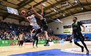 6 January 2024; Shawndale Jones Jnr of Ballincollig in action against Eoin Quigley of Tralee Warriors during the Basketball Ireland Pat Duffy National Cup semi-final match between Garvey’s Tralee Warriors and Irish Guide Dogs Ballincollig at Neptune Stadium in Cork. Photo by Eóin Noonan/Sportsfile