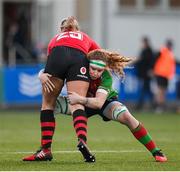6 January 2024; Chloe Thomas Bradley of Brython Thunder is tackled by Ruth Campbell of Clovers during the Celtic Challenge match between Clovers and Brython Thunder at Energia Park in Dublin. Photo by Seb Daly/Sportsfile