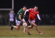 6 January 2024; Darragh Campion of Meath in action against Tom Jackson of Louth during the Dioralyte O'Byrne Cup quarter-final match between Meath and Louth at Donaghmore Ashbourne GAA Club in Ashbourne, Meath. Photo by Seb Daly/Sportsfile