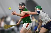 6 January 2024; Evan Hearty of Mayo in action against Aidan Organ of New York during the Connacht Hurling League Cup final match between New York and Mayo at University of Galway Connacht GAA AirDome in Bekan, Mayo. Photo by Tyler Miller/Sportsfile
