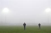 7 January 2024; Kilkenny manager Derek Lyng, left, and selector Peter O'Donovan inspect the pitch in heavy fog before the Dioralyte Walsh Cup Round 2 match between Carlow and Kilkenny at Netwatch Cullen Park in Carlow. Photo by Sam Barnes/Sportsfile