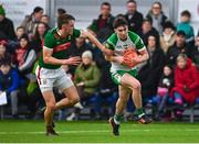 7 January 2024; Shay Rafter of London in action against Donnacha McHugh of Mayo during the Connacht FBD League quarter-final match between Mayo and London at University of Galway Connacht GAA AirDome in Bekan, Mayo. Photo by Tyler Miller/Sportsfile