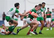 7 January 2024; Eoghan McLoughlin of Mayo in action against Liam Gallagher of London, left, and Aidan McLoughlin during the Connacht FBD League quarter-final match between Mayo and London at University of Galway Connacht GAA AirDome in Bekan, Mayo. Photo by Tyler Miller/Sportsfile