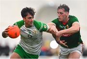 7 January 2024; Liam Gallagher of London in action against Eoghan McLoughlin of Mayo during the Connacht FBD League quarter-final match between Mayo and London at University of Galway Connacht GAA AirDome in Bekan, Mayo. Photo by Tyler Miller/Sportsfile