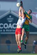 7 January 2024; Brian Kennedy of Tyrone and Jason McGee of Donegal during the Bank of Ireland Dr McKenna Cup Group A match between Tyrone and Donegal at O’Neills Healy Park in Omagh, Tyrone. Photo by Ramsey Cardy/Sportsfile