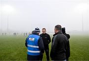 7 January 2024; Referee Eamonn Furlong in conversation with officials before abandoning the Dioralyte Walsh Cup Round 2 match between Carlow and Kilkenny at Netwatch Cullen Park in Carlow. Photo by Sam Barnes/Sportsfile