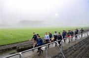 7 January 2024; Carlow players make their way to the warm up pitch in heavy fog before the Dioralyte Walsh Cup Round 2 match between Carlow and Kilkenny at Netwatch Cullen Park in Carlow. Photo by Sam Barnes/Sportsfile