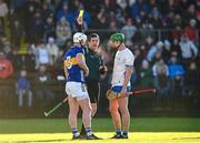 7 January 2024; Referee Simon Stokes shows a yellow card to Michael Breen of Tipperary and Michael Kiely of Waterford during the Co-Op Superstores Munster Hurling League Group B match between Waterford and Tipperary at Fraher Field in Dungarvan, Waterford. Photo by Harry Murphy/Sportsfile