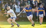 7 January 2024; Padraig Fitzgerald of Waterford in action against Danny Slattery of Tipperary during the Co-Op Superstores Munster Hurling League Group B match between Waterford and Tipperary at Fraher Field in Dungarvan, Waterford. Photo by Harry Murphy/Sportsfile