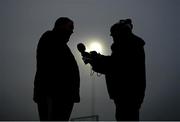 7 January 2024; Kilmacud Crokes manager Robbie Brennan, left, is interviewed by RTÉ before the AIB GAA Football All-Ireland Senior Club Championship semi-final match between Kilmacud Crokes of Dublin, and Glen of Derry, at Páirc Esler in Newry, Down. Photo by Ben McShane/Sportsfile