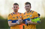 7 January 2024; Clare players Diarmuid O’Donnell, left, and Michael Garry after their side's victory in the McGrath Cup group B match between Waterford and Clare at Páirc Naomh Brid in Lemybrien, Waterford. Photo by Seb Daly/Sportsfile