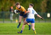 7 January 2024; Shane Griffin of Clare is fouled by Billy O’Keeffe of Waterford during the McGrath Cup group B match between Waterford and Clare at Páirc Naomh Brid in Lemybrien, Waterford. Photo by Seb Daly/Sportsfile