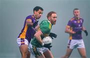 7 January 2024; Conor Glass of Glen in action against Craig Dias of Kilmacud Crokes during the AIB GAA Football All-Ireland Senior Club Championship semi-final match between Kilmacud Crokes of Dublin, and Glen of Derry, at Páirc Esler in Newry, Down. Photo by Daire Brennan/Sportsfile