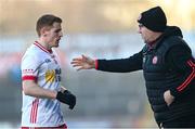 7 January 2024; Tyrone manager Feargal Logan, right, and Peter Harte of Tyrone during the Bank of Ireland Dr McKenna Cup Group A match between Tyrone and Donegal at O’Neills Healy Park in Omagh, Tyrone. Photo by Ramsey Cardy/Sportsfile