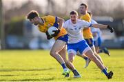 7 January 2024; Manus Doherty of Clare in action against Jason Sheehan of Waterford during the McGrath Cup group B match between Waterford and Clare at Páirc Naomh Brid in Lemybrien, Waterford. Photo by Seb Daly/Sportsfile