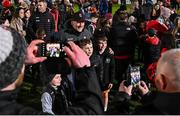 6 January 2024; Derry supporters with Derry manager Mickey Harte after the Bank of Ireland Dr McKenna Cup Group B match between Derry and Down at Celtic Park in Derry. Photo by Ramsey Cardy/Sportsfile