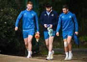 8 January 2024; Leinster players, from left, Ciarán Frawley, Harry Byrne and Jordan Larmour during a Leinster Rugby squad training session at UCD in Dublin. Photo by Harry Murphy/Sportsfile