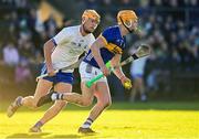 7 January 2024; Conor Whelan of Tipperary in action against Sean Walsh of Waterford during the Co-Op Superstores Munster Hurling League Group B match between Waterford and Tipperary at Fraher Field in Dungarvan, Waterford. Photo by Harry Murphy/Sportsfile
