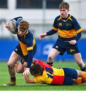 9 January 2024; Edward Nuzum of The King's Hospital is tackled by Oisin Kelly of St Fintan's during the Bank of Ireland Vinnie Murray Cup Round 1 match between The Kings Hospital and St Fintan's High School at Energia Park in Dublin. Photo by Tyler Miller/Sportsfile